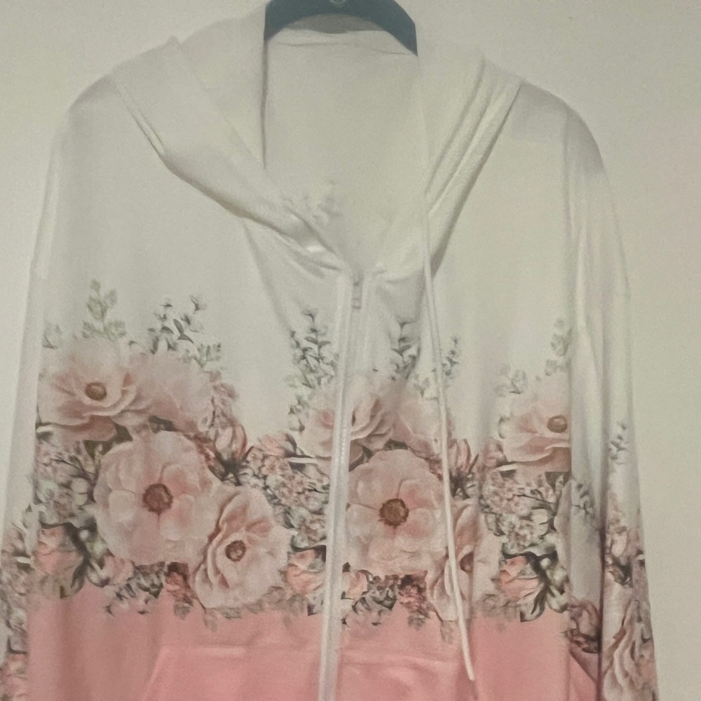 Lovely floral lightweight zip up jacket. NWOT